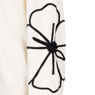 White Sweater with Black Flower Patch